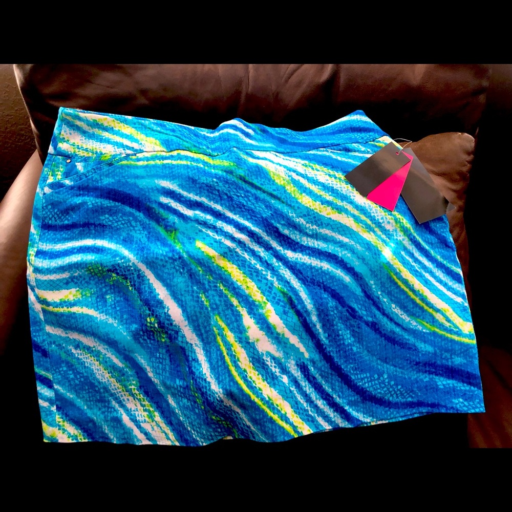 Performance skort by Attyre. Beautiful mix of blue colors